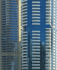 skyscraper background with windows and reflections