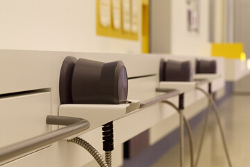 office interior with a row of speakers on the wall