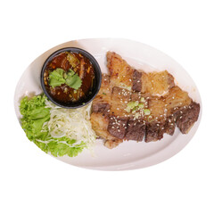 A delicious platter featuring crispy fried fish, accompanied by a spicy dipping sauce and fresh...
