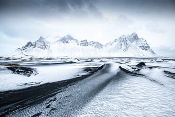 Vestrahorn mountain in winter landscape in Iceland.