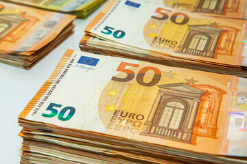 Euro banknote cash money. Lot of banknotes of European union currency close up. Financial investment, savings, income earnings concept.