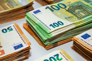 Euro banknote cash money. Lot of banknotes of European union currency close up. Financial investment, savings, income earnings concept.