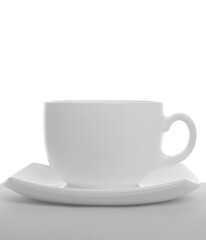 Empty tea cup with saucer isolated on white background
