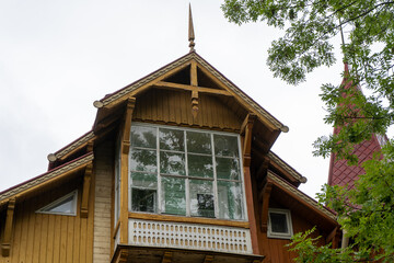 Old wooden house bacon window