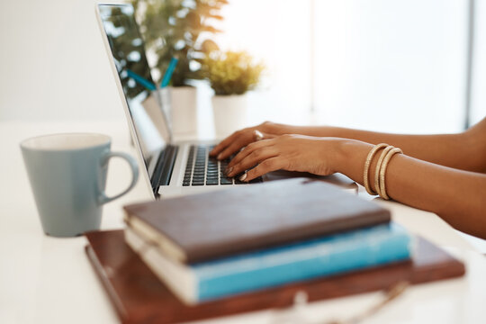 Coffee, writer or hands of woman on laptop in office for research, editing and creative media agency. Books, news story or journalist with technology for publication website, startup and blog update