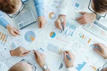 Business team planning. Team of accountants strategizing cost reductions, using detailed data charts and analytics tools