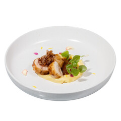 A beautifully plated dish featuring tender chicken, creamy sauce, and vibrant garnishes, showcasing culinary artistry and presentation.
