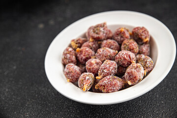 small smoked sausages appetizer mini salami sausage kabanosy fast food fresh tasty food dish delicious gourmet food background on the table rustic food top view copy space