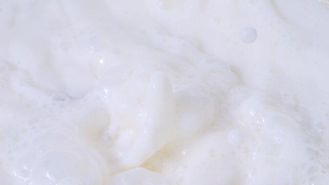 Radishes splashing into milk in slow motion 300fps