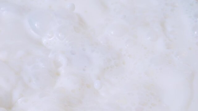 Radishes splashing into milk in slow motion 300fps