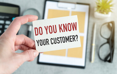 Do you know your customers. Text business concept on office table