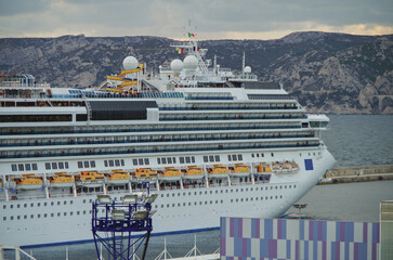 Modern Italian cruiseship cruise ship liner Fascinosa during sunset sail away departure from port...