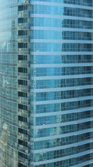 skyscraper background with windows and reflections