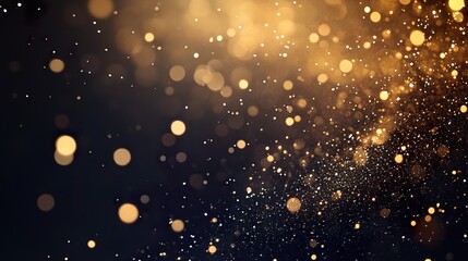 Abstract gold bokeh lights on dark background.