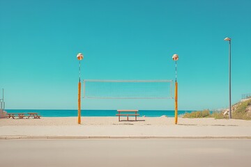 Obraz premium Beach volleyball net with a bench and a bright blue sky