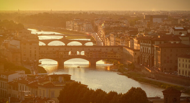 Sunset over Florence's Arno River and Historic Ponte Vecchio
