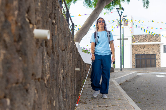 Confident woman navigating urban street independently