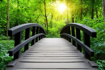 Fototapeta premium A rustic wooden bridge over a tranquil forest stream, surrounded by lush green foliage and dappled sunlight