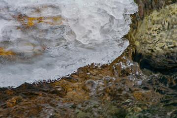 frozen ice in the waterstream
