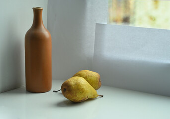 objects on the window are illuminated by evening lanterns