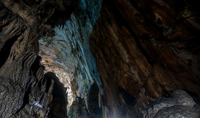 Majestic rock formations in Cacahuamilpa National Park under glowing lights