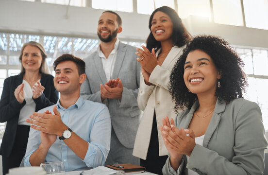 Business people, celebration and applause in promotion, announcement or office negotiation success. Group of employees, clapping and achievement for partnership, prize or workplace contract goal