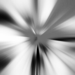 Black and white zoom motion effect. Abstract background. Grayscale lines. Monochrome texture backdrop and banner. Colorless gradient pattern and textured wallpaper.