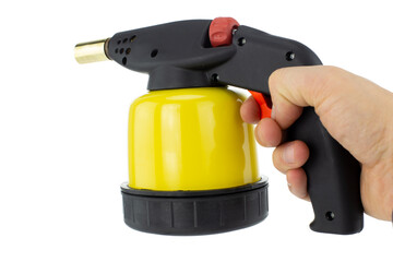 Hand Holding Gas Heat Gun with Yellow Cylinder
