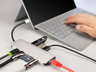 Multi-Port USB Hub Connected to Laptop