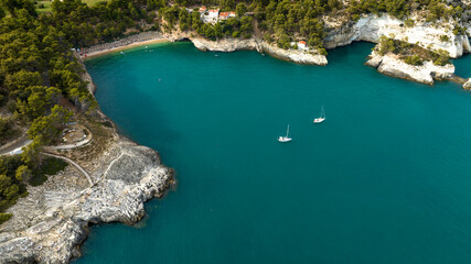 Aerial view of Pugnochiuso beach. It is a beautiful bay in Puglia, Italy. It is a tourist...