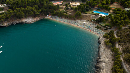 Aerial view of a beach in a small cove.