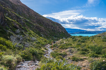 Impressive mountain view on a hike from Paine Grande to Refugio Grey, along lake grey in Torres Del Paine national park, Patagonia, Chile.