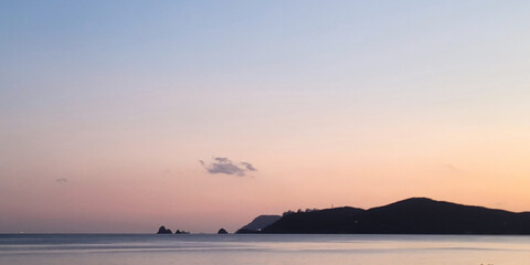 Beautiful OCEAN View from Haeundae Beach during a stunning sunset, in Busan, South Korea, creating a peaceful and beautiful horizon