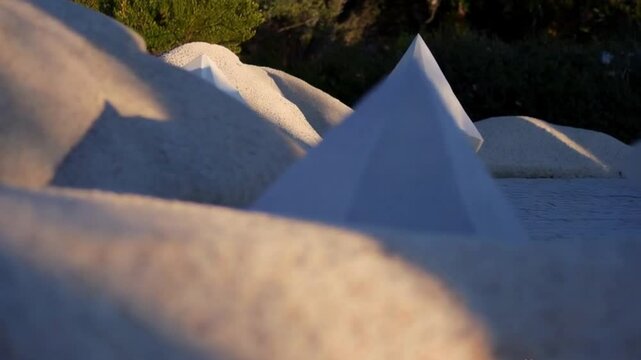 Subtle shadow patterns creating depth in soft shades of blue, green, and beige