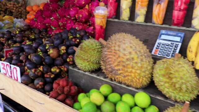 Mangoes pineapple bananas durian and mangosteen in Thai market in Thailand.