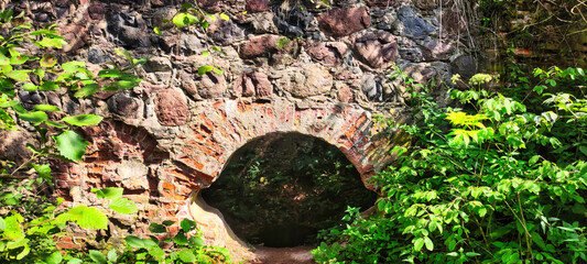 brick building in the forest