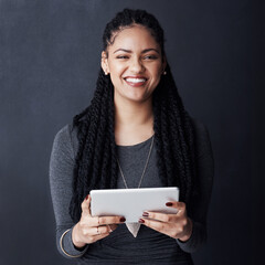 Studio, portrait and woman with tablet for research, online blog and news story as business editor. Career, female person and journalist with digital for publication, happiness and dark background