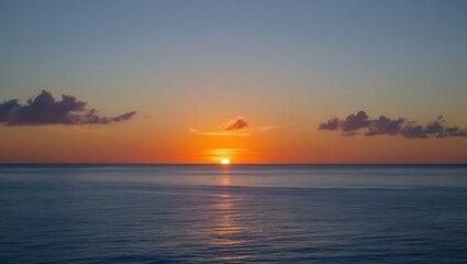 Fototapeta premium Beautiful landscape of a sunset over the ocean