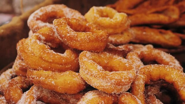 Enjoy homemade churros coated in sugar for an irresistible sweet treat, perfect for any occasion