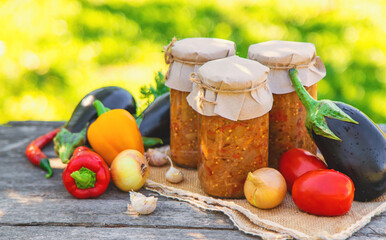Preserving eggplants in a jar. Selective focus.