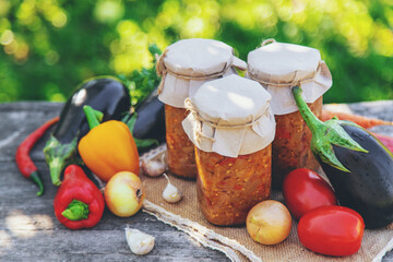 Preserving eggplants in a jar. Selective focus.