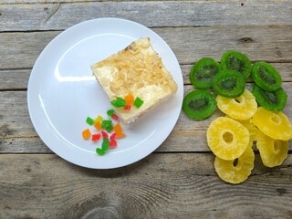 piece of cottage cheese cake on a plate. High quality photos