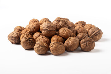 Group of walnuts on a white background
