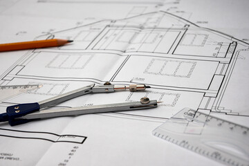 Architectural project being designed with compass, ruler and pencil