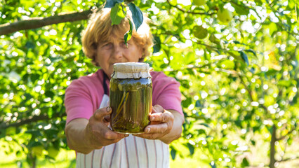 Canned food in jars. Selective focus.