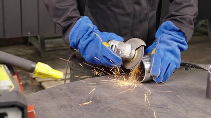 Handheld Angle Grinder in Action A high-speed demonstration of cutting and grinding a metal pipe, showcasing sparks and precision in an industrial workshop setting, with emphasis on safety gear.