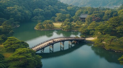 Fototapeta premium Serene Japanese Garden with Wooden Bridge and Tranquil Lake View