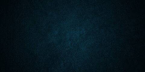 Grunge dark blue rock studio stucco antique grunge spot light backdrop background. concrete distressed gradient limestone sketch wall rough blank aged texture background.