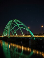 Fototapeta premium Bridge illuminated at night.