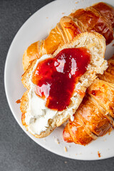 Croissant with jam French toast fresh tasty food dish Delicious gourmet food background on the table rustic food top view copy space